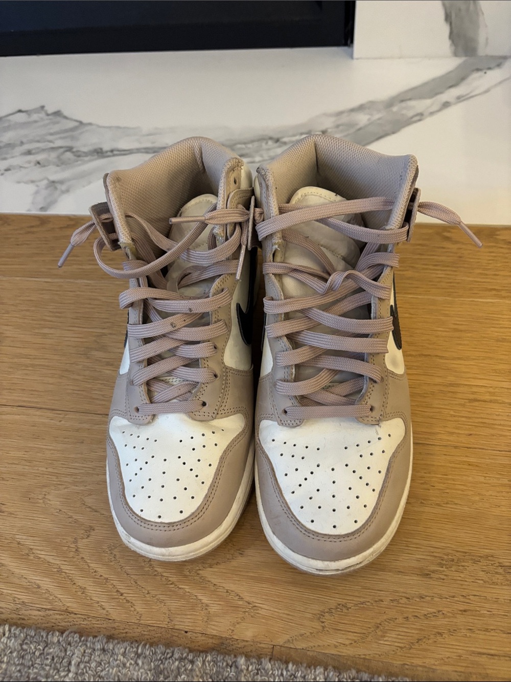 Nike Women’s High-Top Sneakers in Beige and White with Black Swoosh
